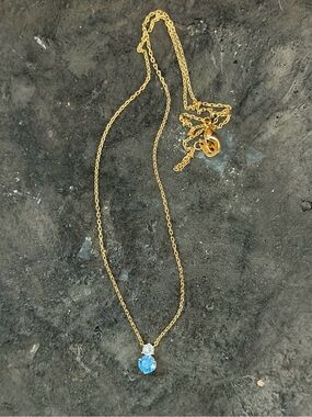 Must Have Gold-Tone Necklace with Blue and Clear Stone Pendant